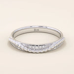 14k solid white gold braided wedding band featuring a row of round brilliant diamonds, minimalist and timeless fine jewelry
