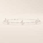 14k solid white gold butterfly chain bracelet with smooth butterfly motifs connected by fine elongated links.
