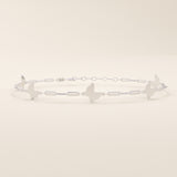 14k solid white gold butterfly chain bracelet with smooth butterfly motifs connected by fine elongated links.
