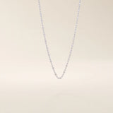 14k solid white gold dot chain necklace with polished flat square stations evenly distributed along the chain, offering a minimalist yet eye-catching design.
