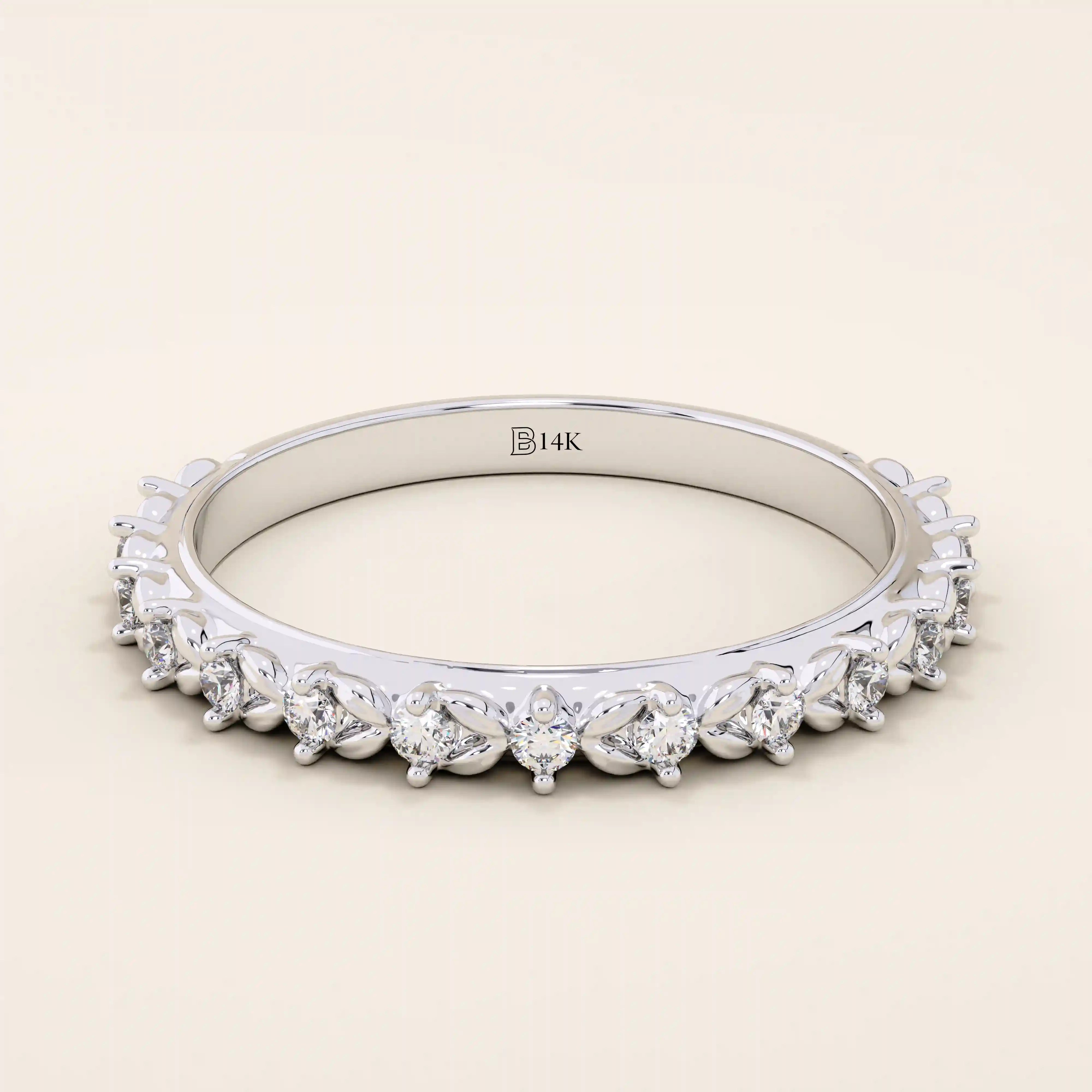 14k solid white gold eternity band featuring round brilliant cut moissanite stones in a delicate leaf-inspired prong setting, elegant stacking ring for wedding or anniversary