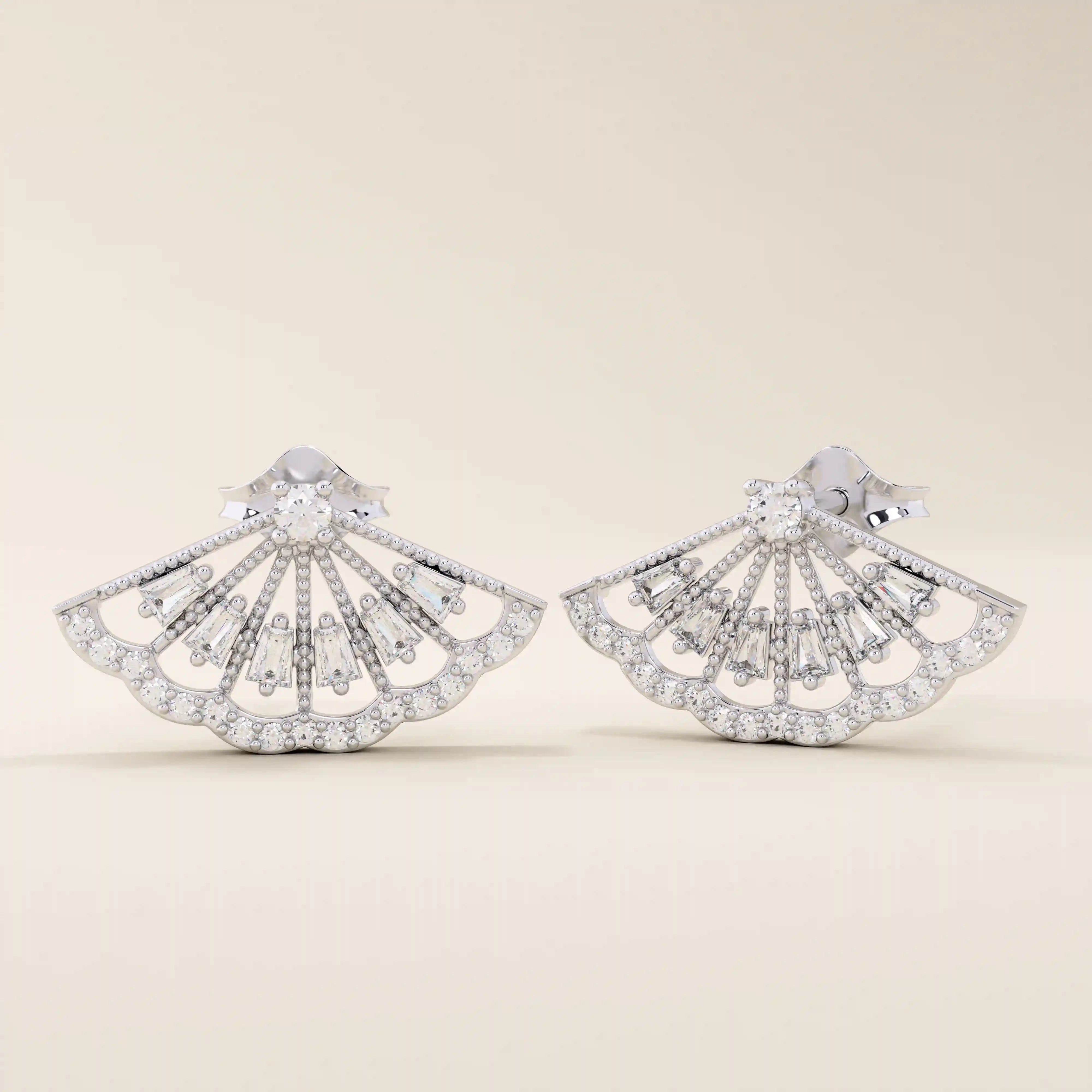14k solid white gold fan stud earrings featuring delicate scalloped edges, intricate open filigree, and a mix of baguette and round moissanite stones.
