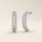 14k solid white gold rope half hoop studs, featuring a pavé line of brilliant white moissanite stones that add radiance to the twisted rope design.
