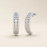 14k solid white gold rope half hoop studs, featuring a pavé line of brilliant white moissanite stones that add radiance to the twisted rope design.
