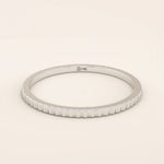 14k solid white gold thin stacking ring featuring a faceted textured design, elegant and versatile jewelry for daily wear or stacking
