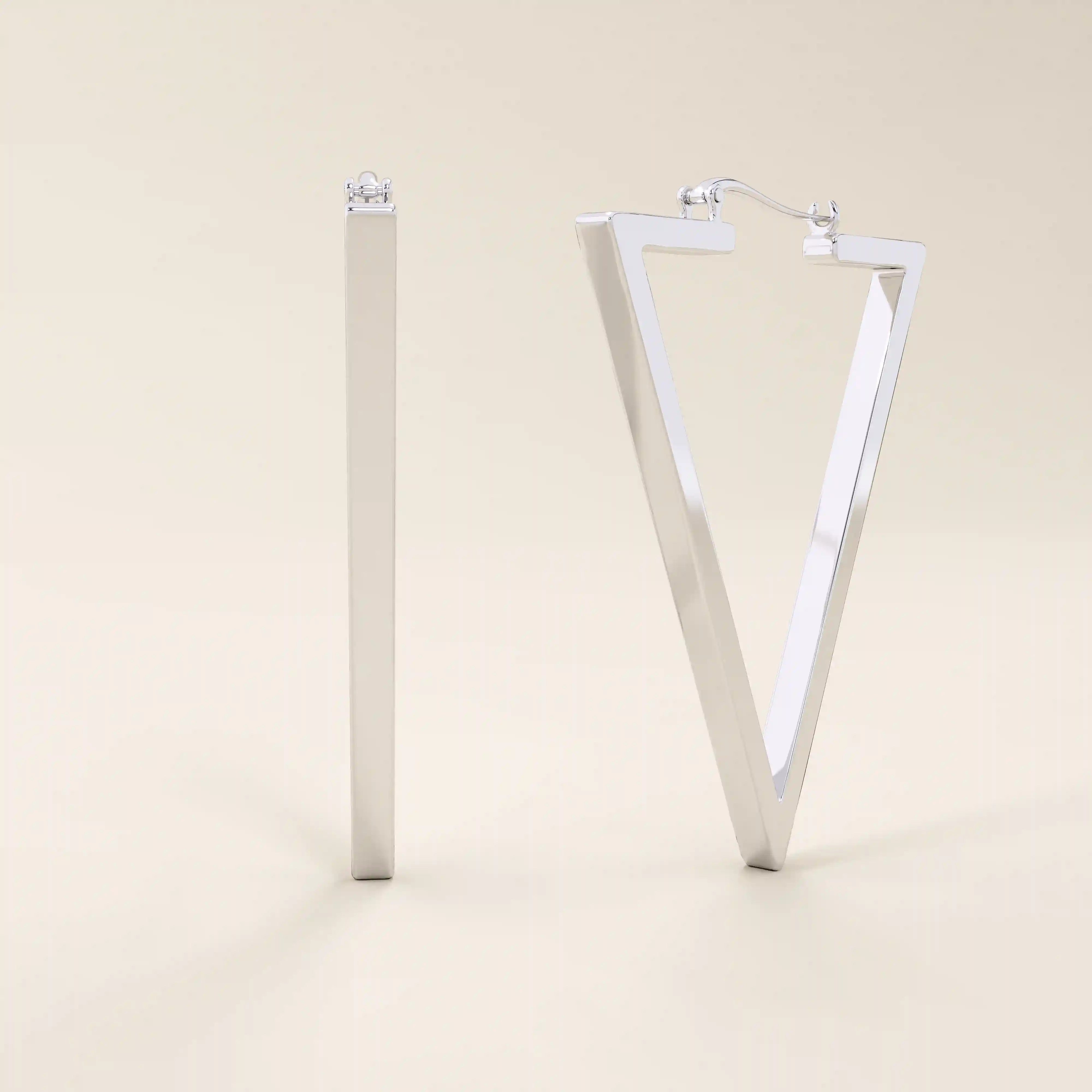 14k solid white gold triangular hoop earrings with clean lines and a polished mirror-like finish, perfect for adding a contemporary edge to any outfit.
