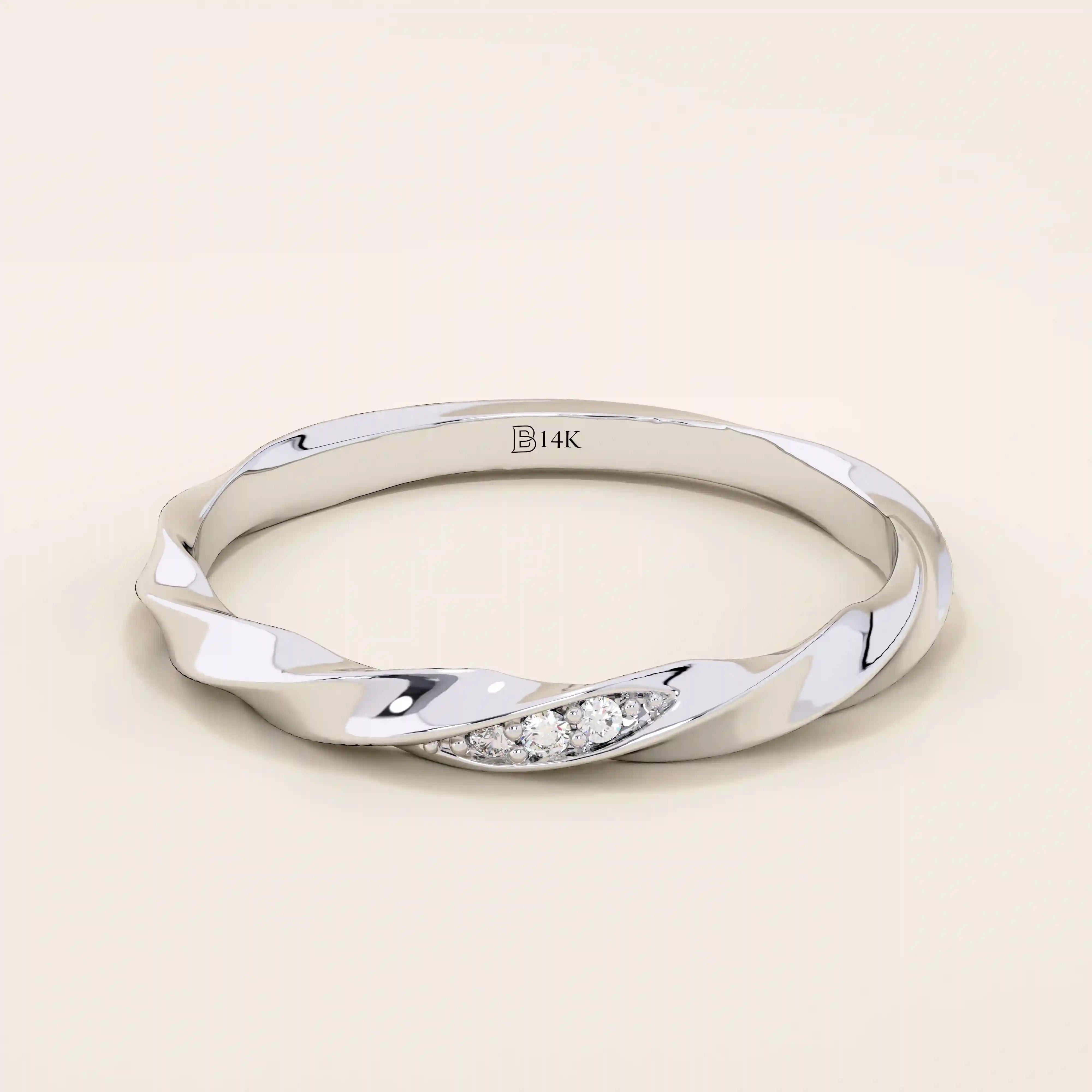 14k solid white gold twisted wedding band featuring a cluster of round brilliant moissanites in a marquise-shaped opening, minimalist and sophisticated style
