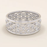 14k solid white gold wide wedding band featuring an intricate open lattice design with bezel-set moissanite stones
