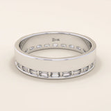 14k solid white gold wide wedding band featuring channel-set baguette moissanite stones in an eternity setting
