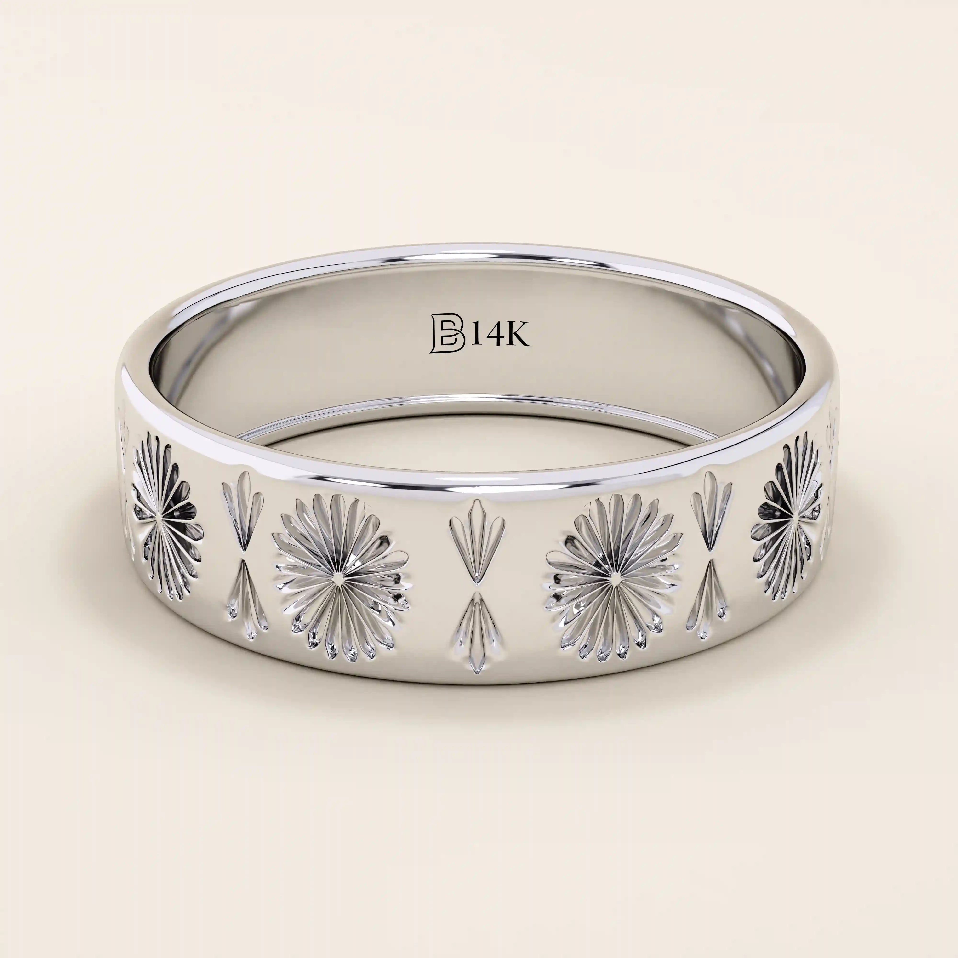 14k solid white gold wide wedding band featuring detailed engraved floral and fan designs for a vintage-inspired look
