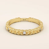 14k solid yellow gold band featuring a laurel leaf design with bezel set round brilliant cut moissanite stones, elegant fine jewelry for weddings or stacking
