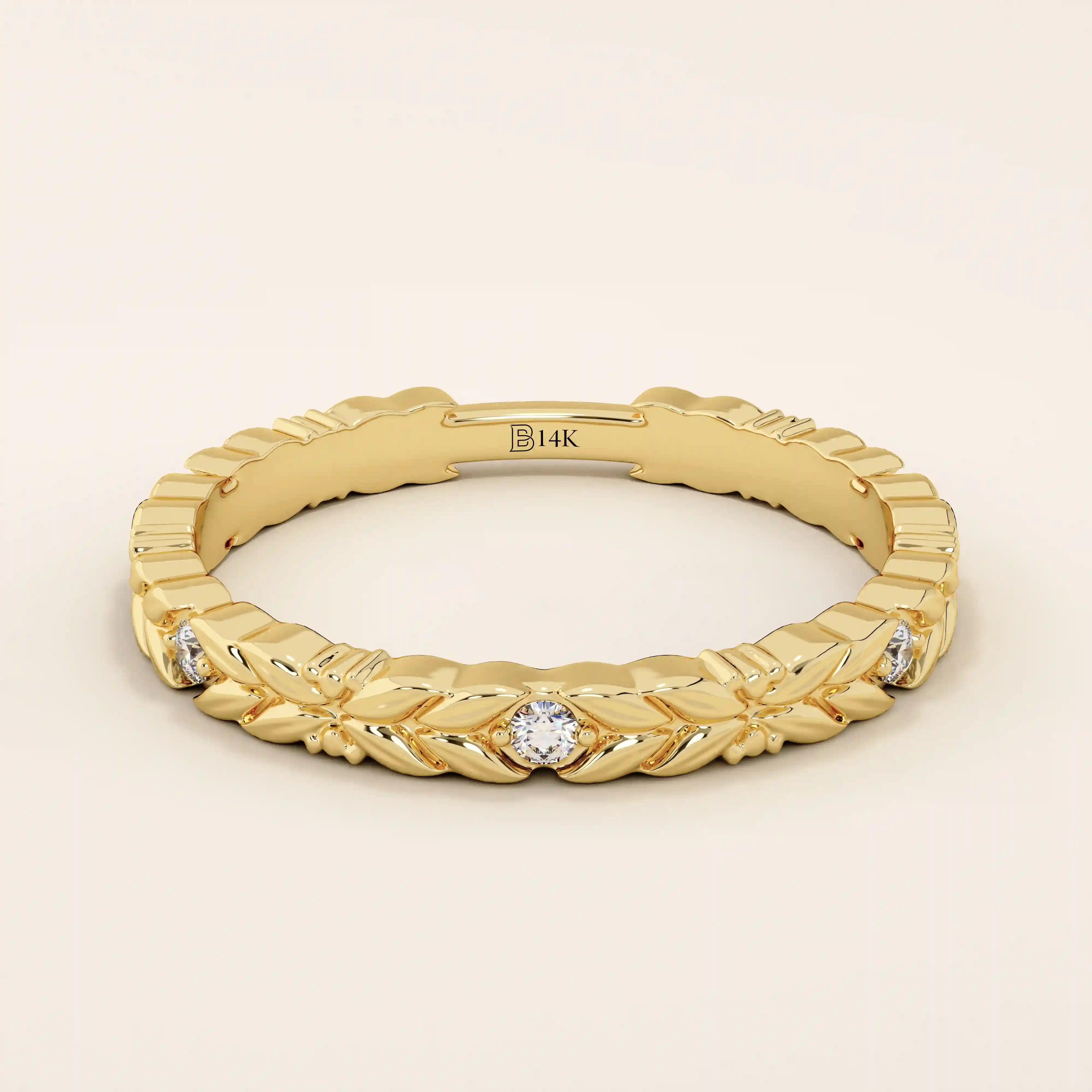 14k solid yellow gold band featuring a laurel leaf design with bezel set round brilliant cut moissanite stones, elegant fine jewelry for weddings or stacking
