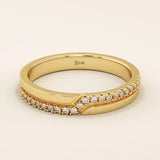 14k solid yellow gold band featuring a pointed chevron design with pavé set round brilliant cut moissanite stones, modern fine jewelry for weddings or stacking
