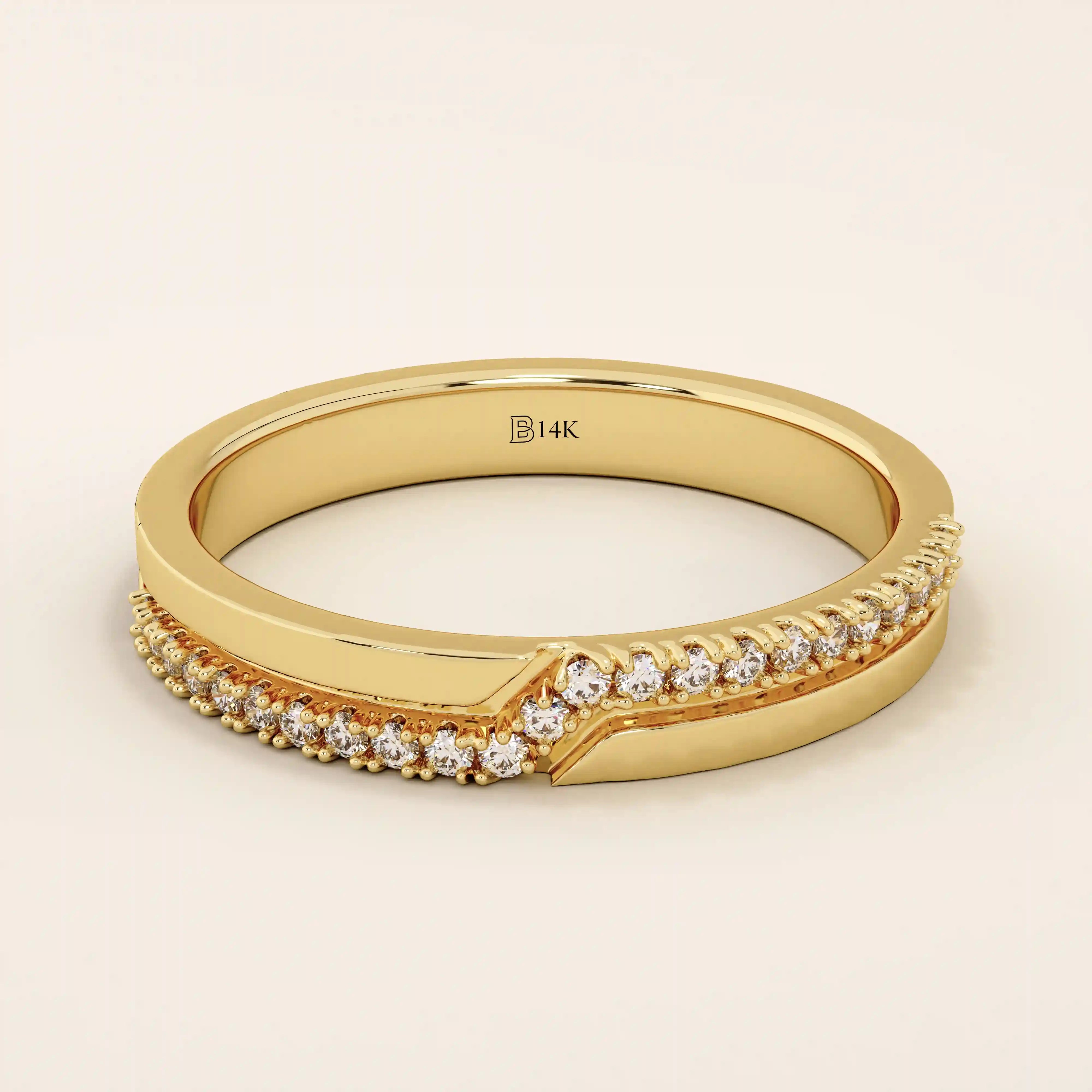14k solid yellow gold band featuring a pointed chevron design with pavé set round brilliant cut moissanite stones, modern fine jewelry for weddings or stacking

