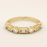 14k solid yellow gold band featuring alternating baguette cut and round brilliant cut moissanite stones in a modern bezel setting, elegant fine jewelry for weddings or stacking
