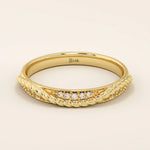 14k solid yellow gold braided wedding band with a row of round brilliant diamonds, delicate and elegant design for everyday wear or special occasions

