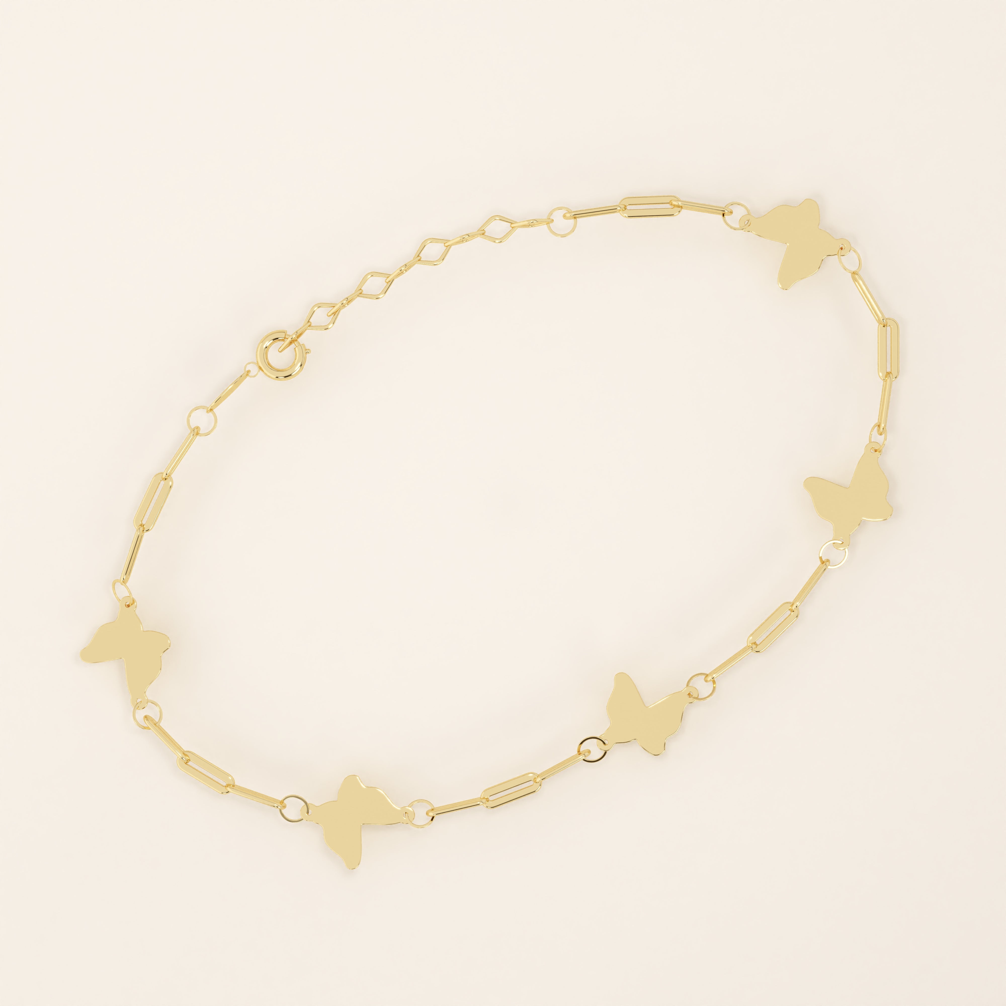 14k solid yellow gold butterfly chain bracelet featuring polished butterfly charms linked with delicate rectangular chain links.
