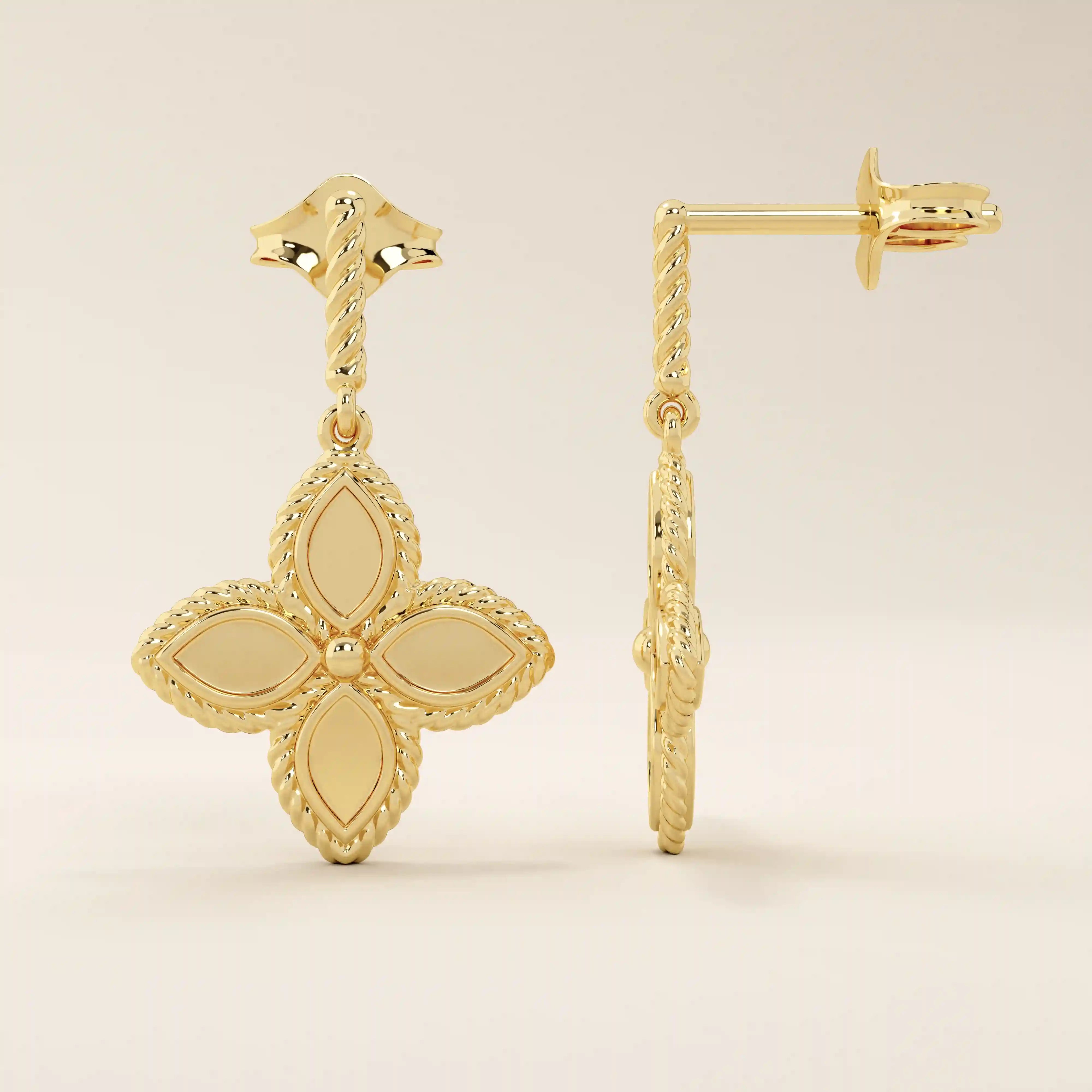14k solid yellow gold dangle clover stud earrings featuring a twisted post and a four-petal clover drop with beaded edges.
