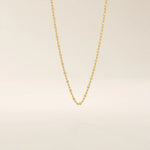 14k solid yellow gold dot chain necklace featuring small, evenly spaced flat square discs linked along a delicate chain, creating a sleek and modern everyday piece.
