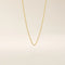 14k solid yellow gold dot chain necklace featuring small, evenly spaced flat square discs linked along a delicate chain, creating a sleek and modern everyday piece.
