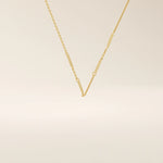 14k solid yellow gold flat bar chain necklace featuring slim, polished rectangular bar stations evenly spaced along a delicate cable chain, creating a sleek and modern accessory.
