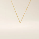 14k solid yellow gold flat bar chain necklace featuring slim, polished rectangular bar stations evenly spaced along a delicate cable chain, creating a sleek and modern accessory.

