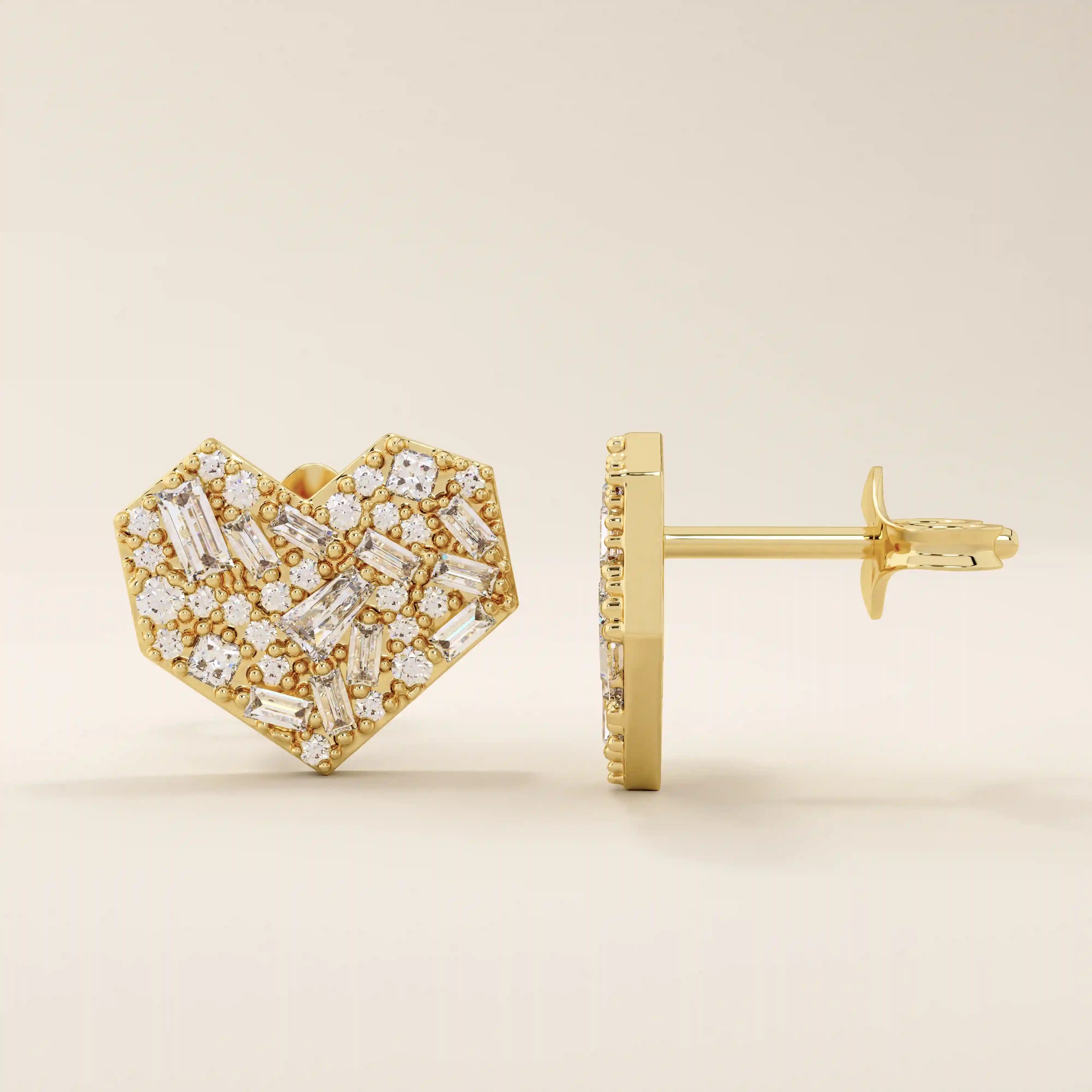 14k solid yellow gold heart-shaped stud earrings adorned with mixed-cut white moissanite stones, featuring a combination of baguette and round cuts for a sparkling, textured look.