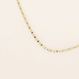 14k solid yellow gold mariner chain necklace featuring flat, polished interlocking links with signature bar accents, offering a classic yet refined nautical-inspired design.
