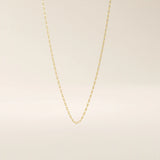 14k solid yellow gold mariner chain necklace featuring flat, polished interlocking links with signature bar accents, offering a classic yet refined nautical-inspired design.
