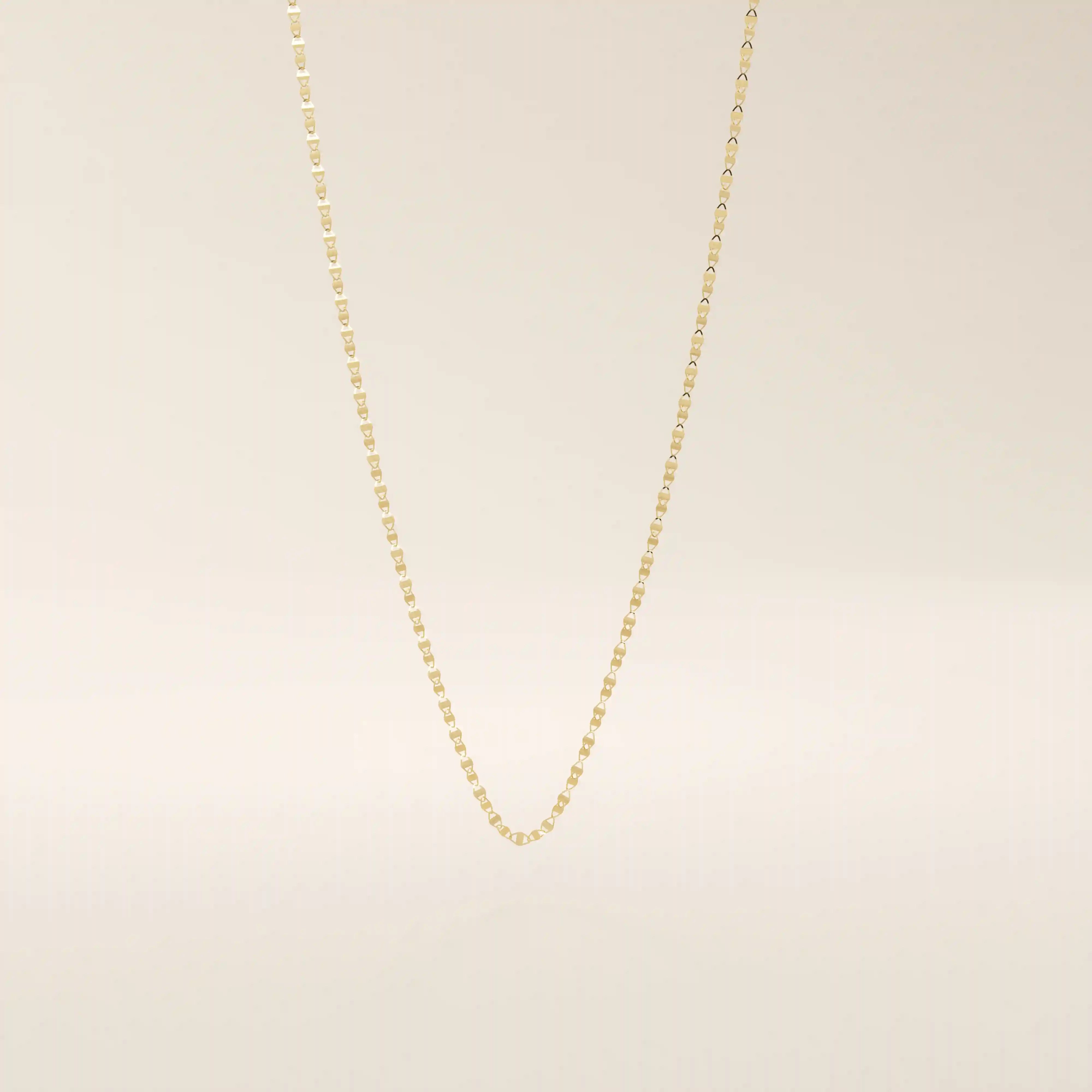 14k solid yellow gold mariner chain necklace featuring flat, polished interlocking links with signature bar accents, offering a classic yet refined nautical-inspired design.
