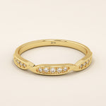14k solid yellow gold stacking ring with three marquise-shaped sections set with sparkling round brilliant cut moissanite stones, minimalist fine jewelry band for everyday wear or wedding stack