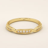 14k solid yellow gold stacking ring with three marquise-shaped sections set with sparkling round brilliant cut moissanite stones, minimalist fine jewelry band for everyday wear or wedding stack