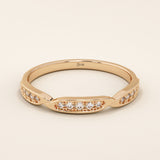 14k solid yellow gold stacking ring with three marquise-shaped sections set with sparkling round brilliant cut moissanite stones, minimalist fine jewelry band for everyday wear or wedding stack
