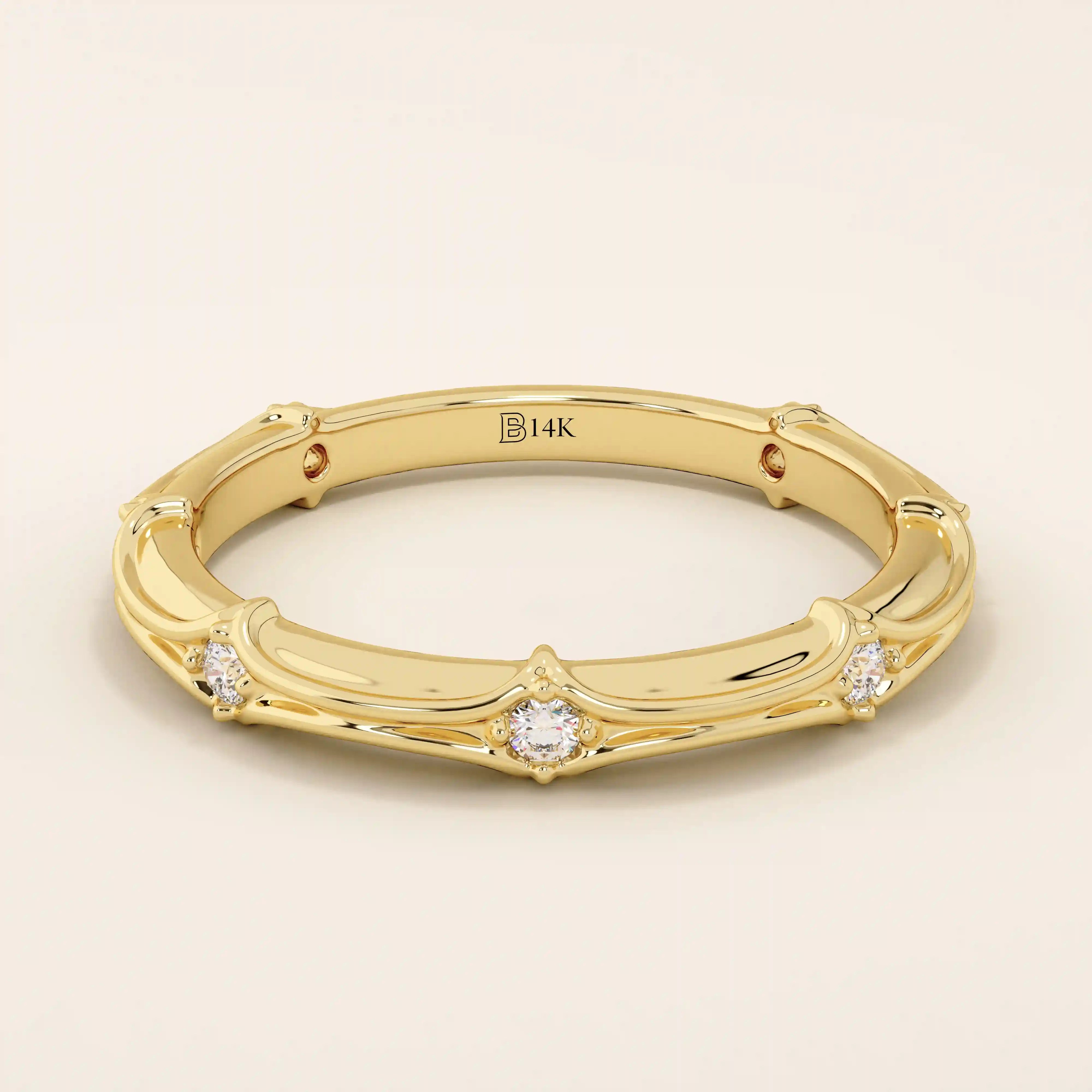 14k solid yellow gold wedding band with a bamboo-inspired design, featuring evenly spaced round brilliant-cut moissanites
