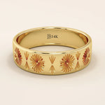 14k solid yellow gold wide wedding band with intricate engraved floral and fan motifs in a repeating pattern
