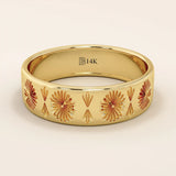 14k solid yellow gold wide wedding band with intricate engraved floral and fan motifs in a repeating pattern
