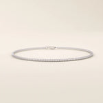 14k white gold bracelet featuring a fine wheat chain with intricate interwoven links.
