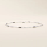 14k white gold bracelet featuring oval chain links with alternating polished yellow gold bar accents.
