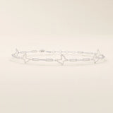 14k white gold butterfly bracelet with open butterfly silhouettes connected by polished chain links.
