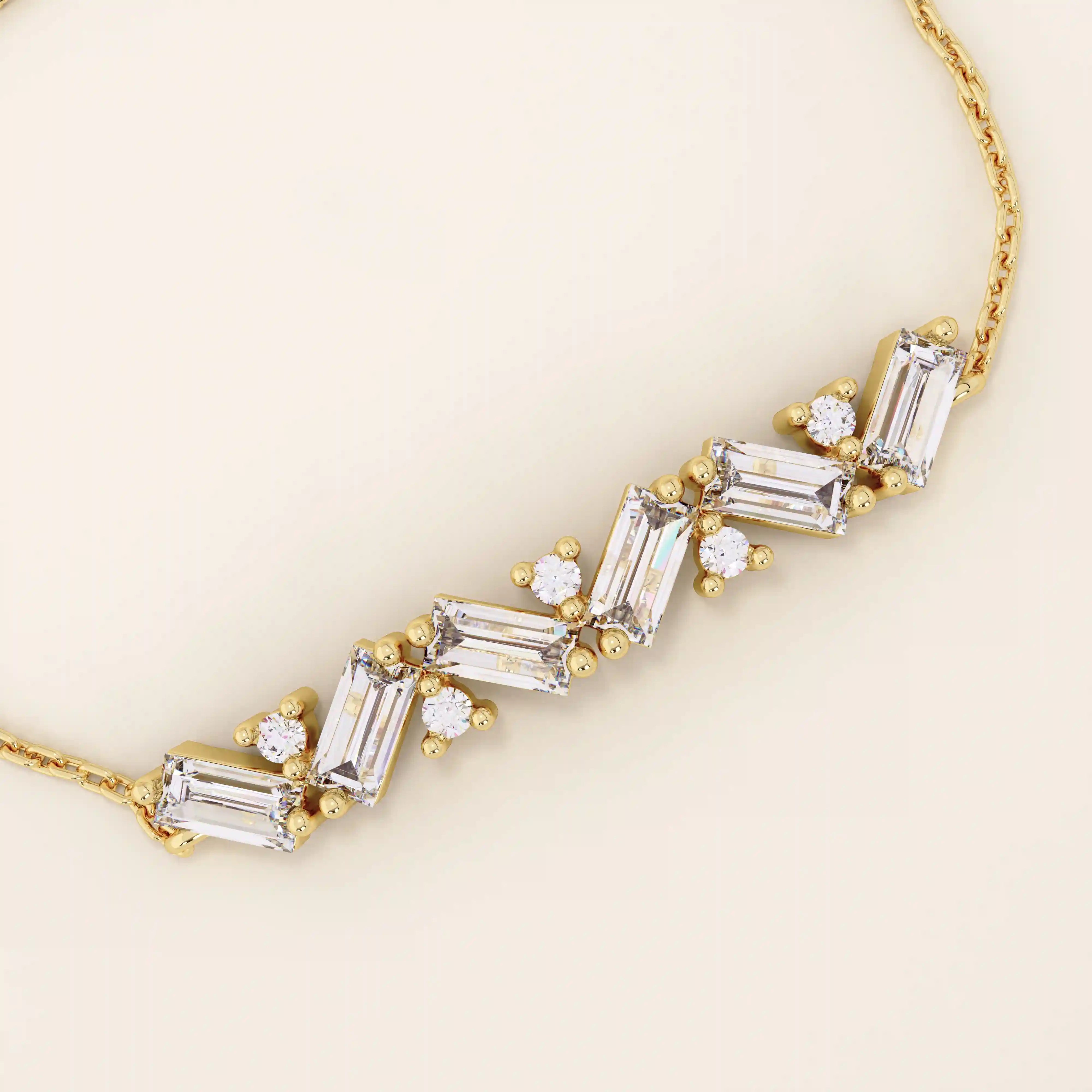 14k yellow gold baguette bar bracelet featuring baguette-cut stones and round brilliant stones set in a sleek chain.
