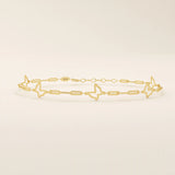 14k yellow gold bracelet featuring open butterfly charms linked with elongated chain links for a delicate look.
