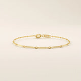 14k yellow gold bracelet with alternating flat bar links and oval cable chain for a sleek, modern design.
