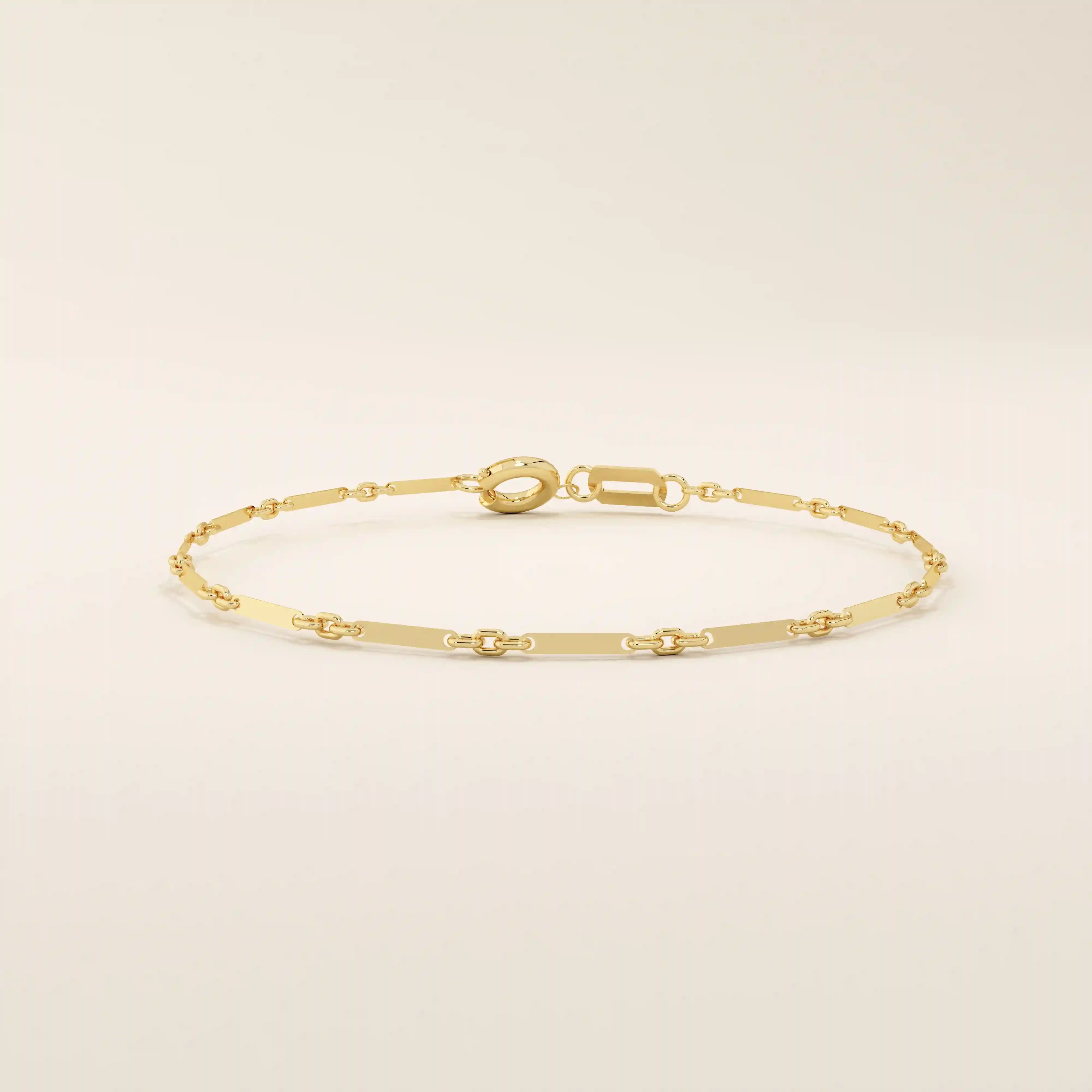 14k yellow gold bracelet with alternating flat bar links and oval cable chain for a sleek, modern design.
