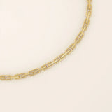 14k yellow gold bracelet with slim elongated links forming a modern link chain design.

