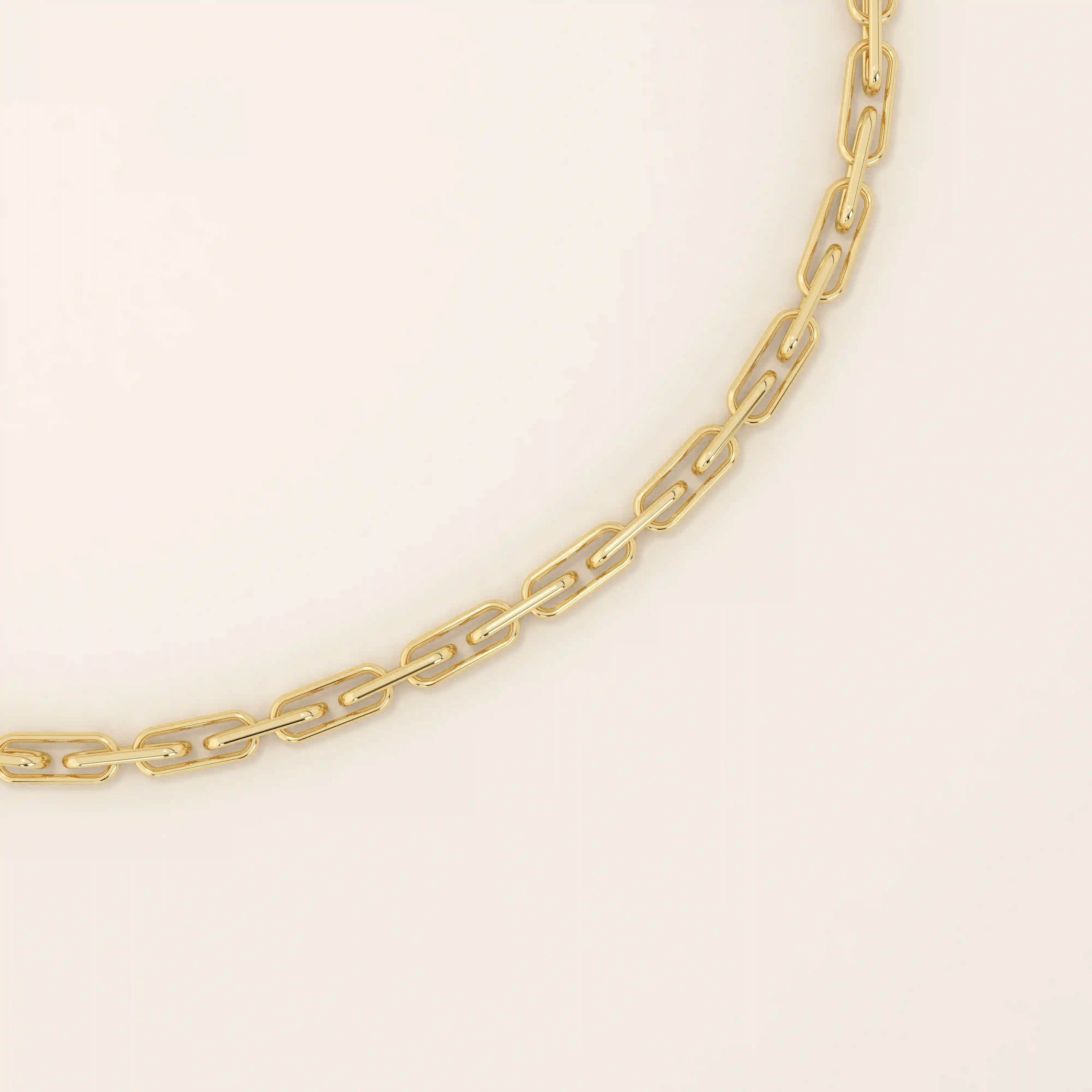 14k yellow gold bracelet with slim elongated links forming a modern link chain design.
