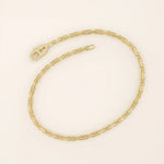 14k yellow gold bracelet with slim elongated links forming a modern link chain design.
