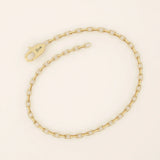 14k yellow gold rolo chain bracelet featuring interlocking rounded rectangular links with a smooth polished finish.
