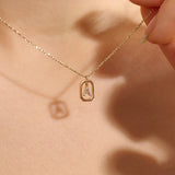 Dangling Letter Necklace in Gold