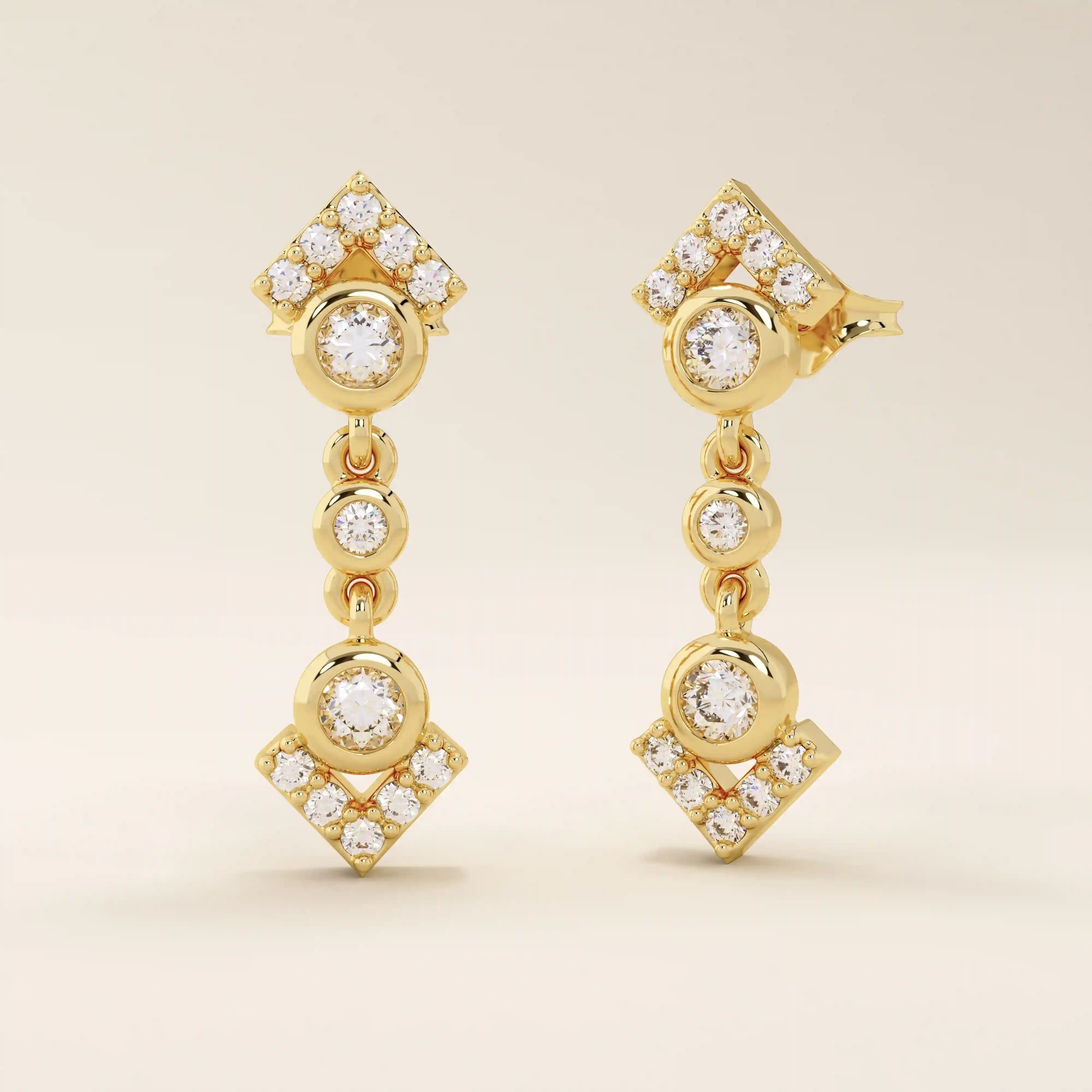 Angled view of 14k solid yellow gold dangling arrow studs, highlighting the linked bezel settings and pavé arrowhead ends.
