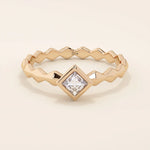 Bezel set princess square cut solitaire engagement ring in 14k solid gold. Sleek modern design for women.